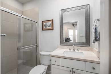 First floor en-suite bath with a large walk-in clo
