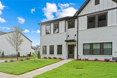 View of front of property featuring a front yard, 