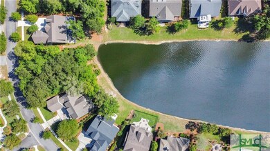 Aerial view of property & adjacent lagoon.