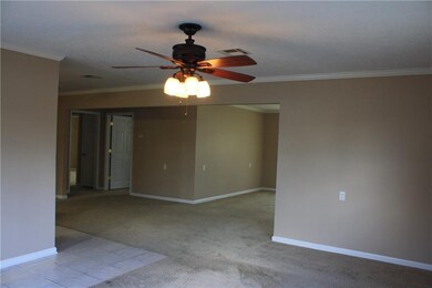 Den looking into the 2nd living area