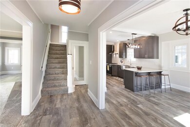 Open Floor plan. Traditional Center Hall Colonial, new flooring and light fixtures