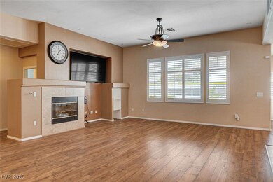 Large Family Room with plank flooring and ceiling
