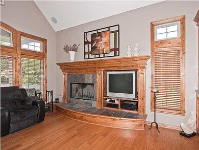 Vaulted hearth room with surround sound. Main floo