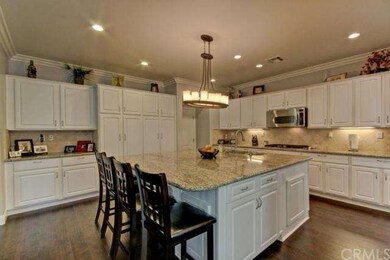 Chefâ€™s gourmet kitchen, with large kitchen islan