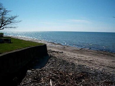 Waterfront/Dock/Pier At the end of the treed road is this beach and beautiful view of the lake