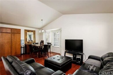 Vaulted Ceilings in the living room and dining are
