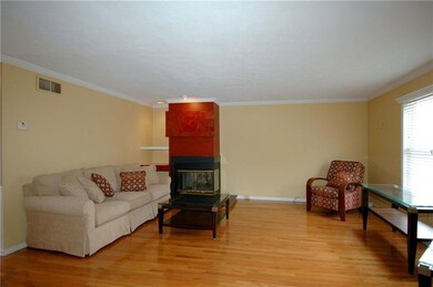 Another view of the living room and fireplace!
