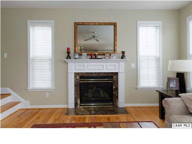 Family room has a gas fireplace and is open to the