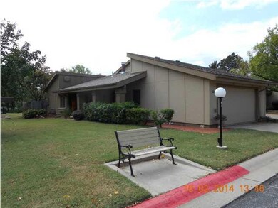 2 car attached garage. Lots of yard which is anoth