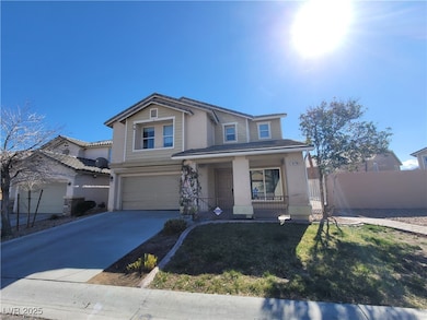 Traditional home with a porch, an attached garage,
