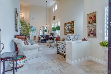 Double door entry, beautiful travertine tile floor