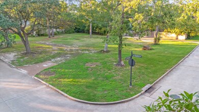 Fantastic corner lot nestled in Hunters Creek Vill