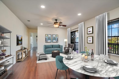 Dining room featuring visible vents, wood finishe