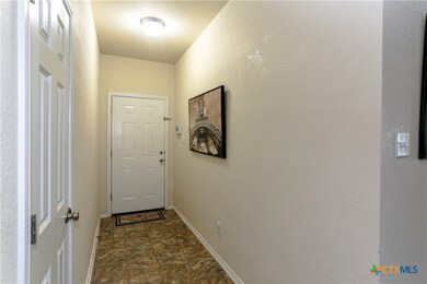 Entry way showing tiled floor 11 x 4 ft.