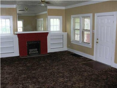 Spacious Living Room w/ Hardwood Floors under Carp