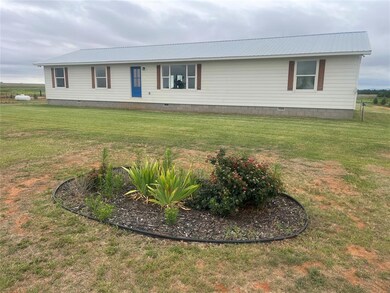 View of front of property with a front lawn