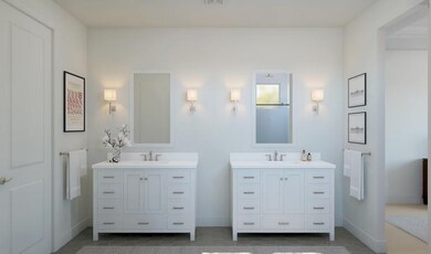 Primary bath with dual freestanding vanities