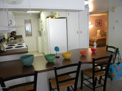 open kitchen with washer/dryer