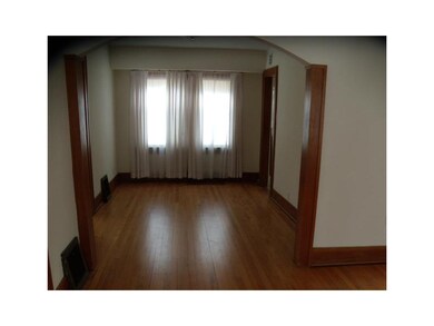 Dining Area. with Refinished Wood Floors and Natur