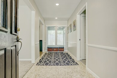 Tile front entry, can lighting, huge formal living