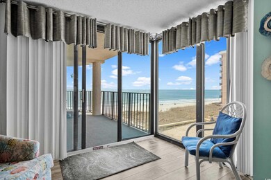 Interior space featuring a view of the beach.