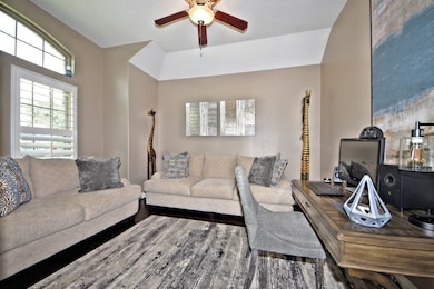 Beautiful Upgraded Glass Panel French Door Opens to your Study or Media Room!  Upgraded 2 tone Interior Paint, Gorgeous Wood Floors, Plantation Shutters and more!