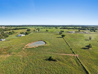 Aerial view of property's location featuring rural landscape