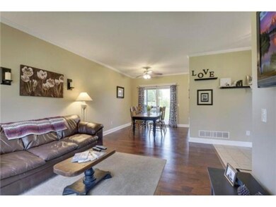 Hickory floors and enameled trim and crown molding
