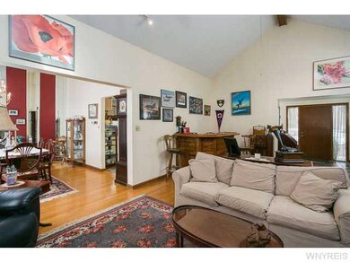 Living Room. Living room opens to dining room high