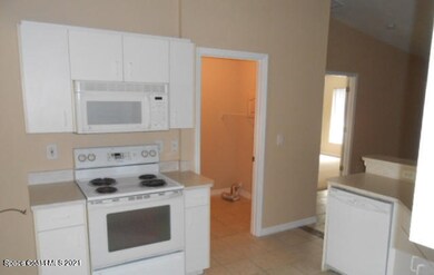 Kitchen with white cabinetry