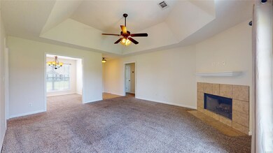 Den, Dining and Foyer open to each other.