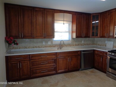 lite cherry cabinets & corian counters