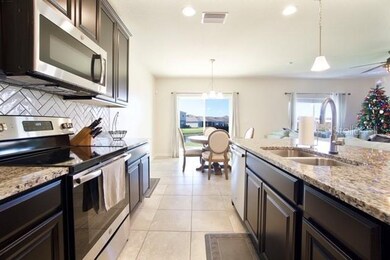 10159 Hawks Landing Dr, Land O' Lakes, FL 34638 - photo 2