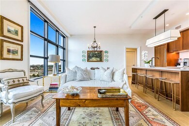 Floor to ceiling windows and 10' ceilings provide