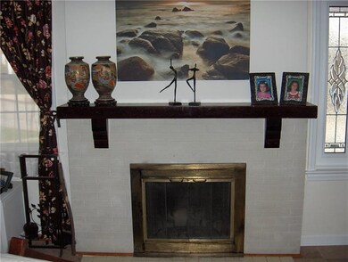 Wood burning fireplace in living room