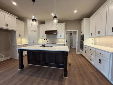 4628 SW Robinson Dr, Raymore, MO 64083 - photo 2