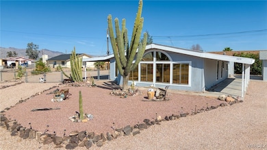 View of front of property with a mountain view and