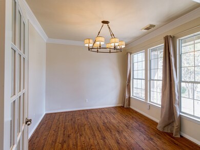 Dining room with modern fixtures.