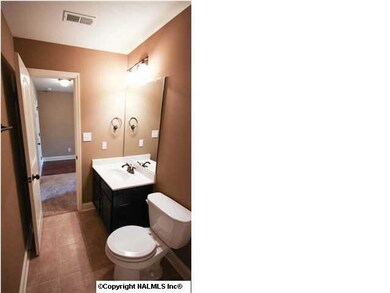 Oil rubbed bronze plumbing fixtures.