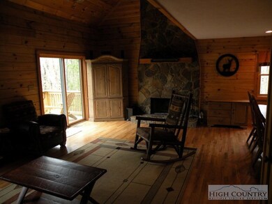 Living Room: A large open family room with vaulted