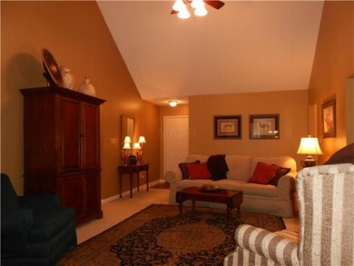 Looking from the den into the entry hall