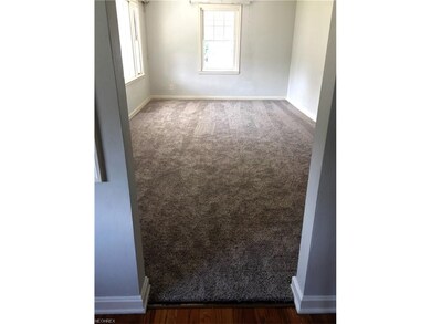 Warm wood flooring and new carpeting compliment th