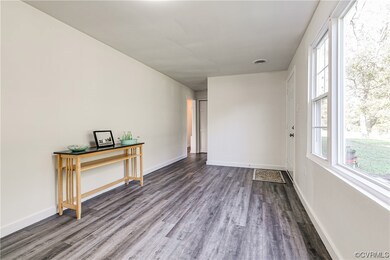 View of wood floored empty room