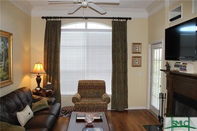 Living room with gas fireplace overlooking the mar