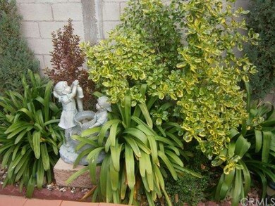 fountain sorrounded with flowers 