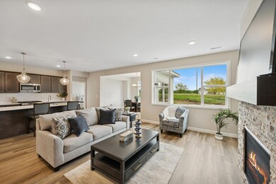 Living Room - photo is of a previous inventory home. Inquire for more details and options.