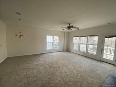 Large main level family room with new carpet, fire