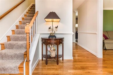 Beautiful Entrance Foyer with Hardwood Floors