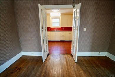 FRECNH DOORS TO CLOSE OUT KITCHEN