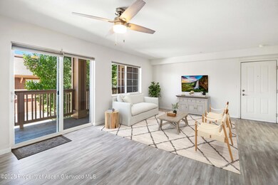 living room with balcony access - staged